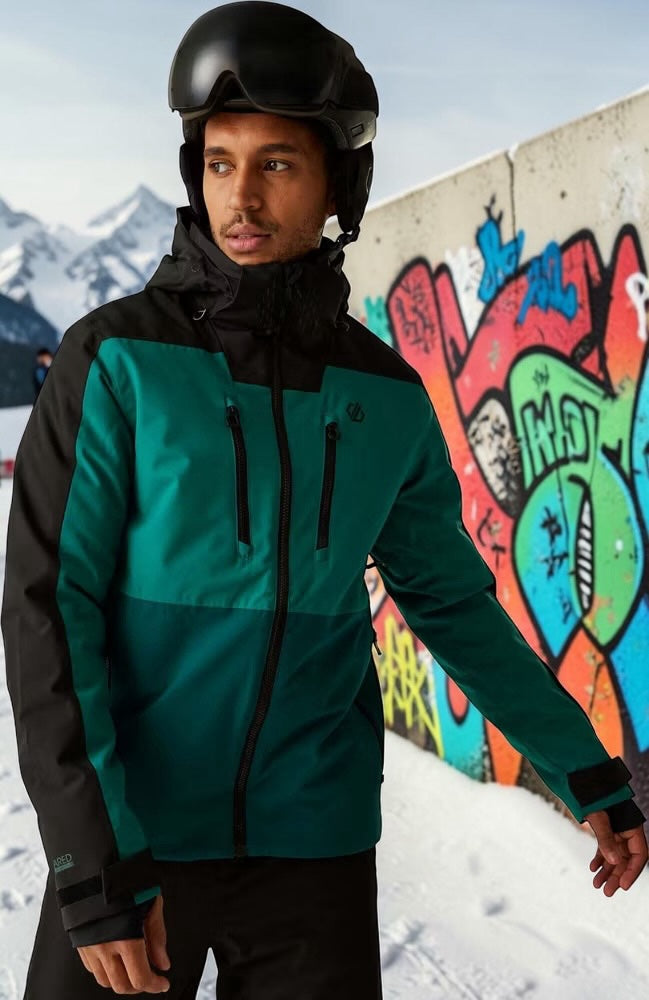 Aurora Fashion men's teal and black waterproof insulated ski jacket with hood worn by a skier in a snowy setting.